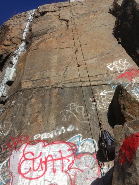 The route climbs the face just left of where the rope is.
