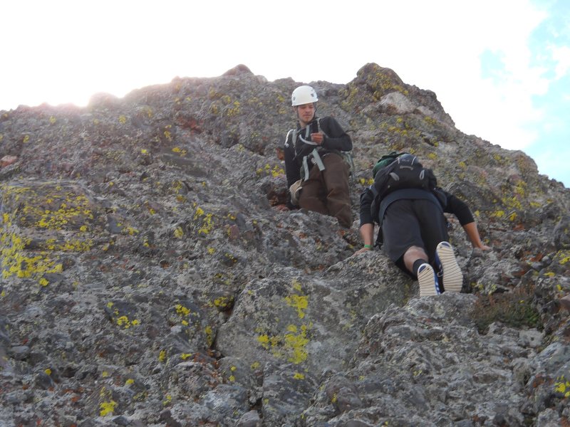 Climbers on the class 4 pitch. More like low class 5.