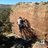 Brad working the crux moves of Souz is OK.