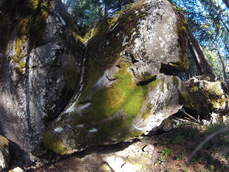 Start matched on a good blocky hold down and left. make your way right up the arete on slopy holds for the left and crimps under the belly with the right. bust a big move to the good ledge and scoot around right and up V5-ish