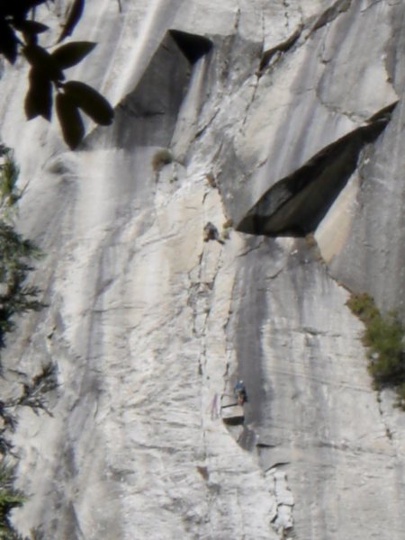 John Ely leading crux finger crack on final pitch of Super Slide, belayed by John Hoffman. Photo: Bethany Sanders