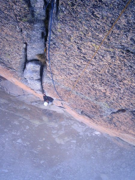 Lea on the off width exit of pitch two, Hägar (6a+)