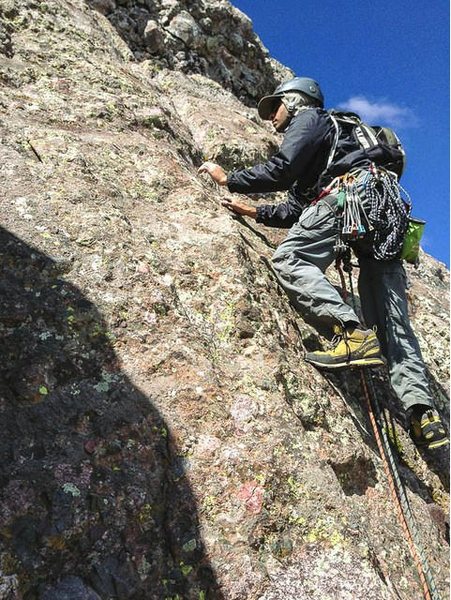 Starting up the final (crux) pitch. <br>
<br>
Photo by Dan Perry.