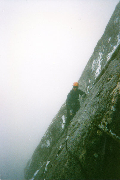 Chris Harris leading icy slabs to top out upper pitches. Sufferfest.