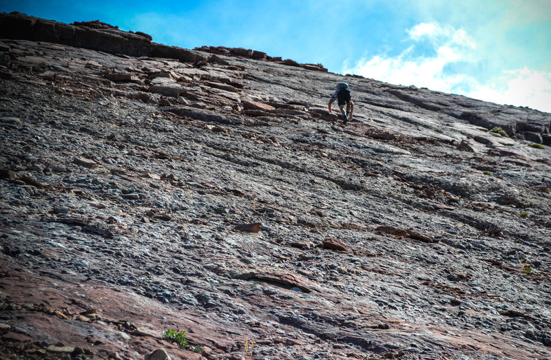 The last section of the face before gaining the summit ridge. Rock quality is deteriorating.