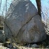 Arrowheadish-shaped boulder.