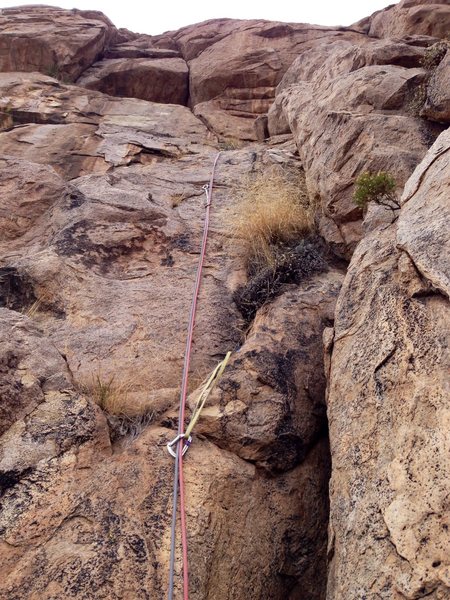 Last step up Pitch 1 (to the belay below the interesting Pitch 2). Photo Cheryl Bare.