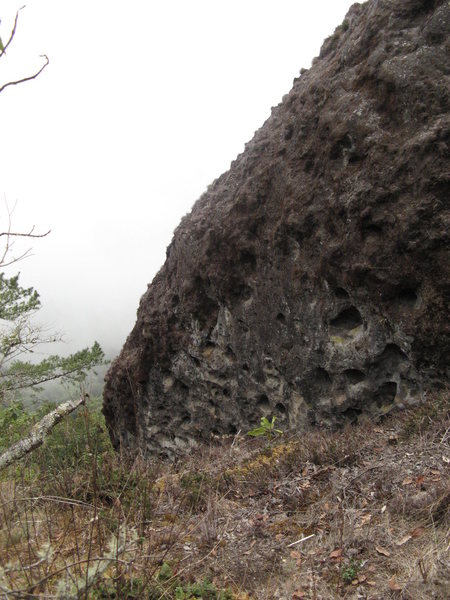 This is just the top 5' of the rock; the ground drops about 50' right in front there into a crevasse where the sport climbs are.