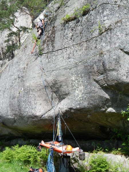 Ian gaining the slab while Freddy relaxes on the ledge.