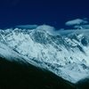 Mt. Everest (very top center of photo) from near the Tibetan Buddhist Monastery of Tengboche, part of the Sherpa community, Khumbu region of Nepal.