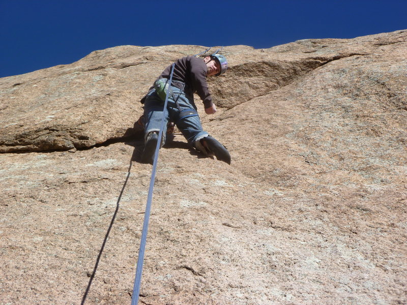 At the roof, the second crux.