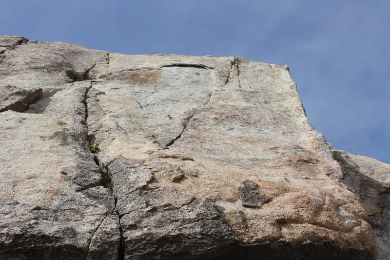 You can see one bolt in the middle of the wall. The 2nd one is up and right, toward the arete.