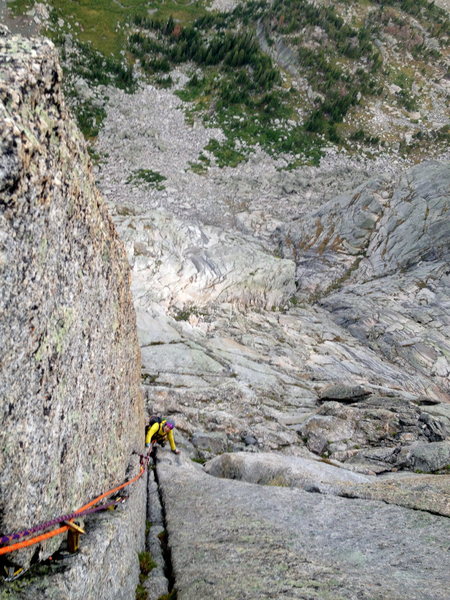 Michelle coming up the crux corner of East Face Left Side Cracks on Pingora in the Cirque of the Towers. Although the guide lists this as the crux, I managed to find a few other offwidths (likely off route) that did seem 5.8