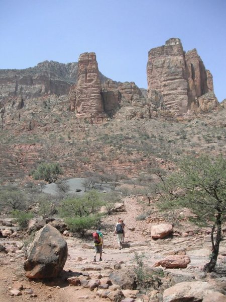 This line goes up around to the back of smaller tower (left). Local priests won't allowe climbers to attempt the larget tower.
