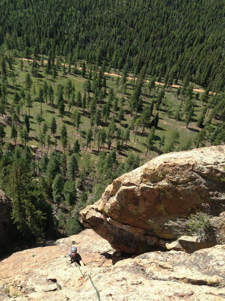 Barker finishing the route, coming up the gully.