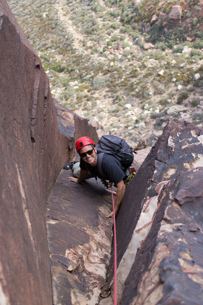 Tanner climbing at the top of Pitch 3...