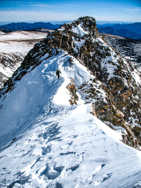 Eddie traversing one of the narrower sections of snowy ridge.