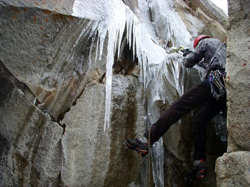 First pitch of Scrappy's Child leading through the chimney in icy conditions.