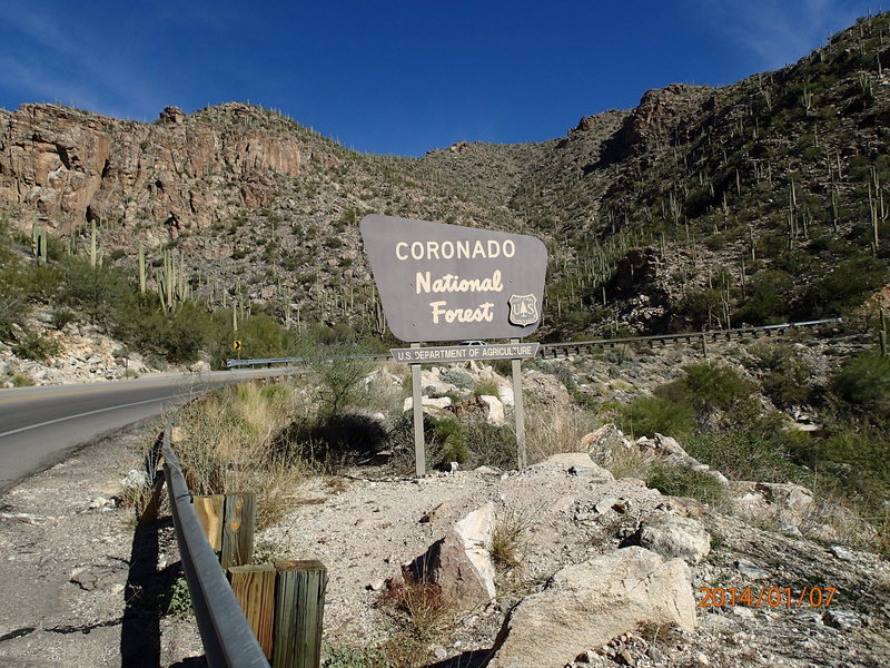 Parking pull off, climbing area is behind the sign on the other side of the road.