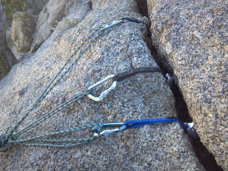 TR gear anchor at the top left of the route. Three tricams. There are other placements further right with either large cams or a few lengths of webbing to sling and extend the masterpoint.