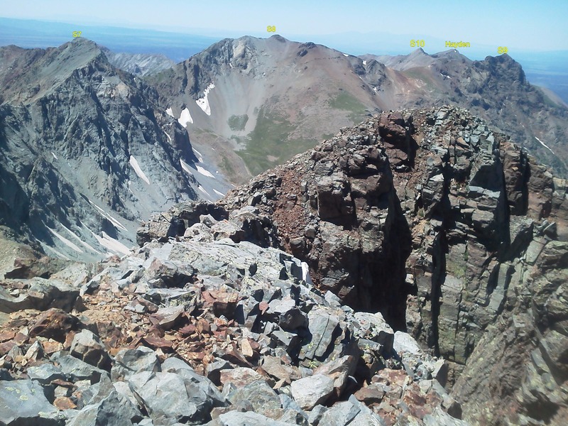 Close up is the lower West Summit of Mears with the remainder of the traverse stretching west. S9 (Peak 13,134) on right and several big humps (including S10, 13,020') out to Hayden Peak (12,987). Peak 13,252 (S8) is the high mound in the center. S7 (13,220) is encountered just prior to Ruffner Mountain on the left.