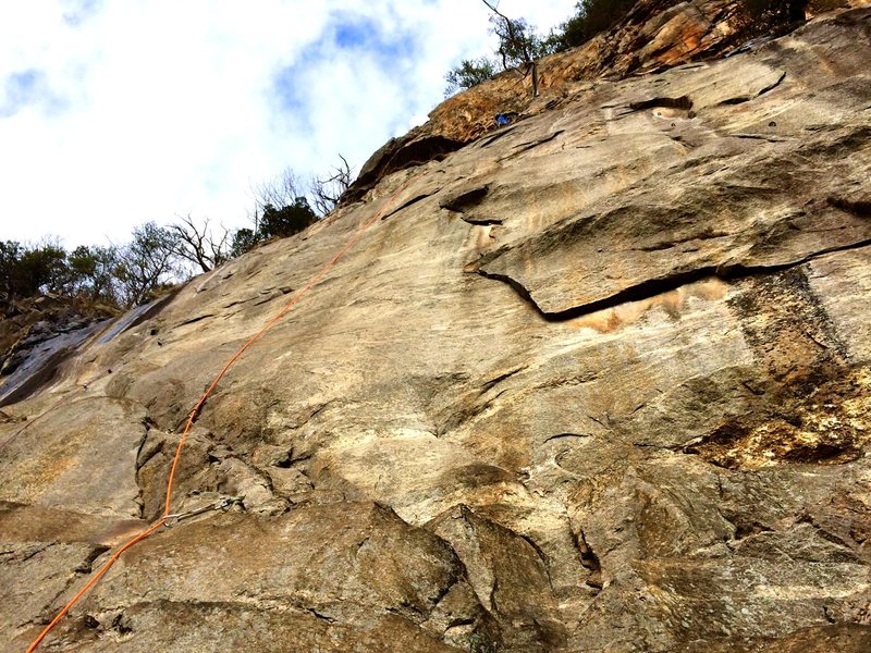 Huffin Cedar follows the flake system out left before coming back right to a bolt and anchors.