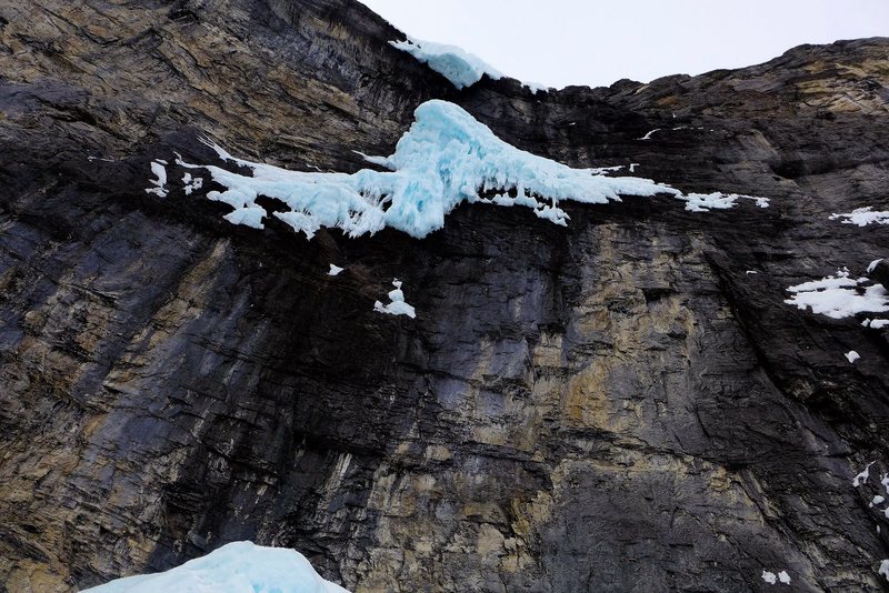 Big Drip from below. The rock section felt more like M9 and very loose. Bolts ended way below the ice. Feb 2014.
