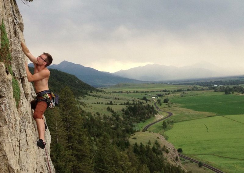 Andrew Leider scoping out the chains as a storm rolls in. Amazing views from up top