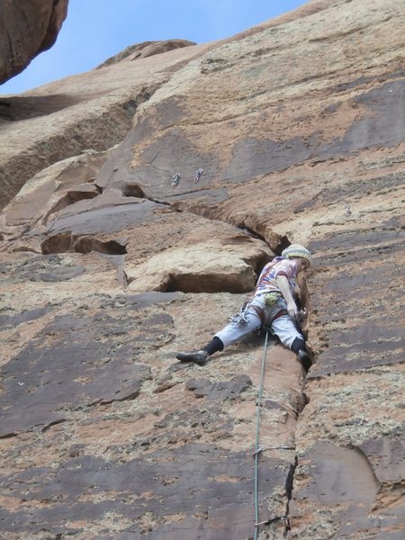 Jess on Nameless Crack. Standard anchors are above her head to the right or finish out the crack to Black Bart's anchor.