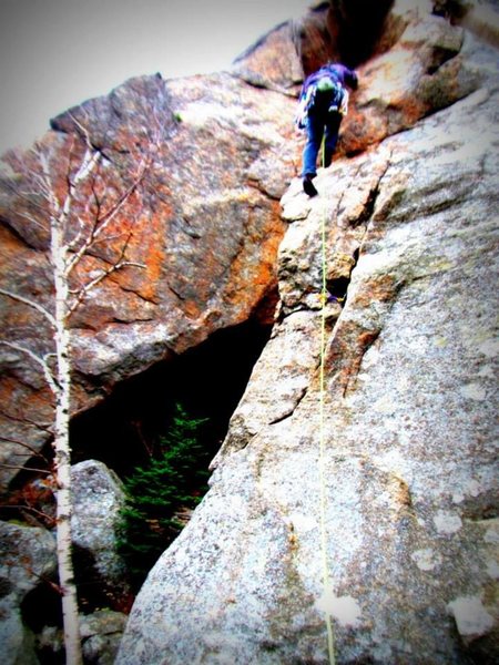 Ben Michaels starting the boulder-y crux.