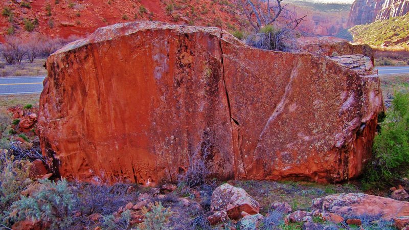 The Diane Boulder, located next to CO Highway 141, is home to several good boulder problems. Grasshoppers climbs the obvious crack at the boulder's center.