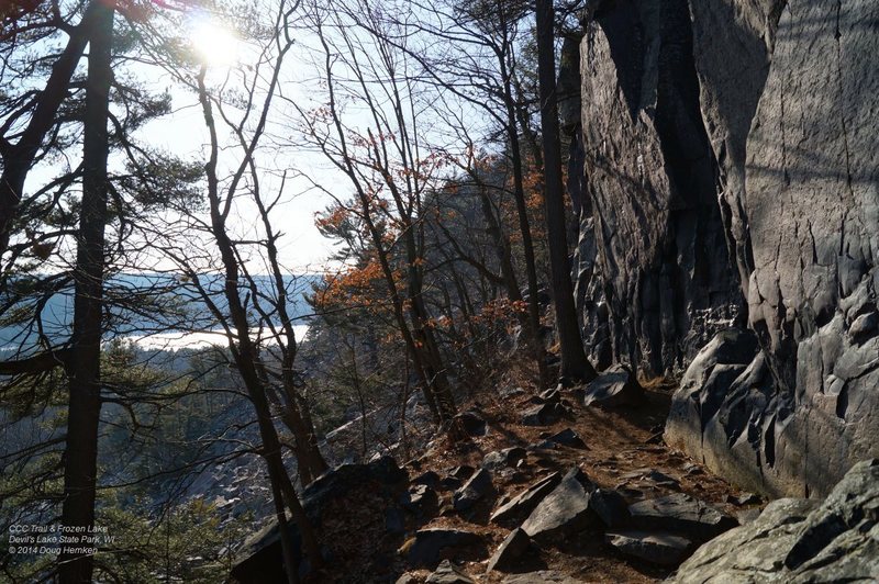 CCC trail at "The Flatiron", and the frozen Lake in the distance