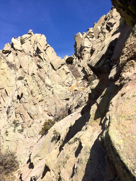 Little Squaretop can be seen as the little nub sticking out (top left). The chute full of foliage is the approach hike leading up to Little Squaretop and Little Squaretop Massif.