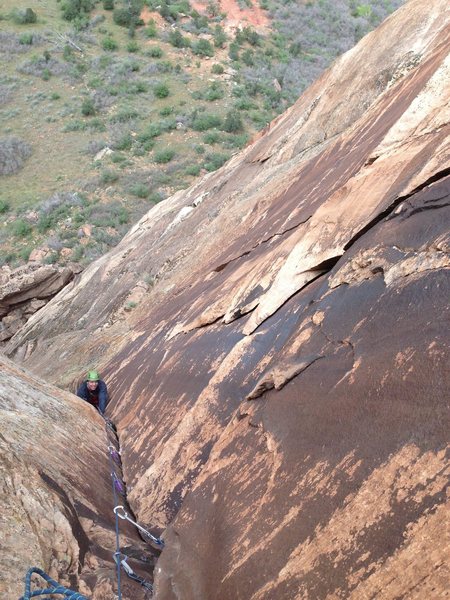 Looking down from the belay atop the crux.