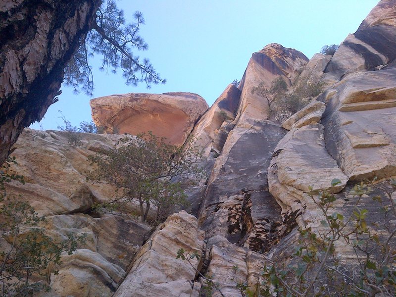 looking up at the first pitch, climbs the face and crack in the orange corner