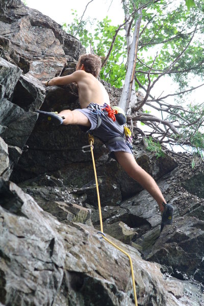 The crux overhang, which is the last of three that are almost equally as difficult. This is a tricky route for the grade.