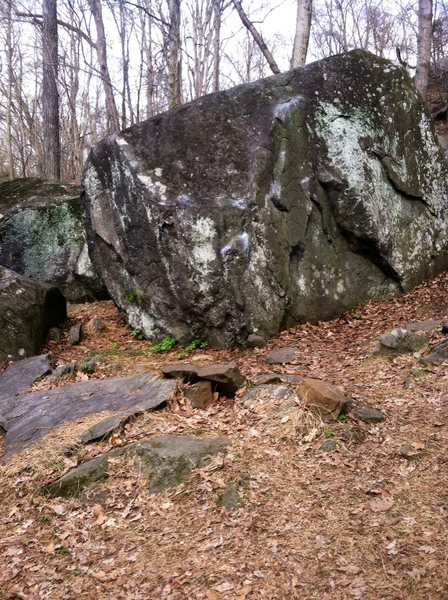 Anybody have any info on this boulder? Seems to be home to several easy problem from v0-v2