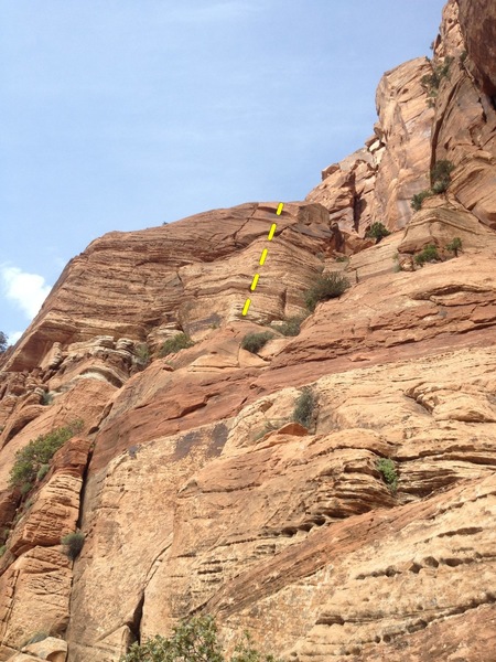 Route climbs up to and past the right leaning crack.