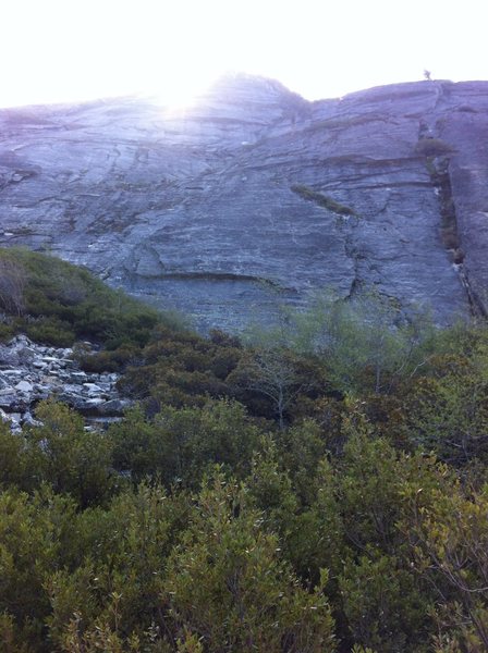 Belly Button Slab as seen from the talus approach. You can see the horizontal mini-roof matching the hand-drawn topo.