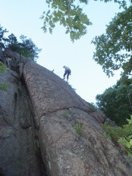 It's a poor photo, but it's all I've got. Unhappy Cracks is the flaring dihedral to the climber's left.