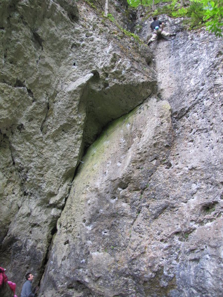 Jonas at the top of Verschneidung. You can see how the route follows the dihedral up, under the roof, and up again.