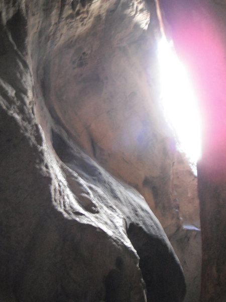 continue climbing up until you become level the glowing light out to your right. then easily traverse out passing a really old home made hanger.