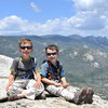 The boys scrambled 1,400 vertical feet up a steep ridge to nab the summit of Sentinel Peak, in the Southern Sierra. Dome Rock and the Needles are visible in the background.