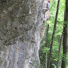 A climber at the crux of Dezentraler Energiepfad.