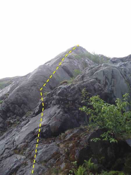 Start on the right face then cross on the and arete and climb up to an anchor.