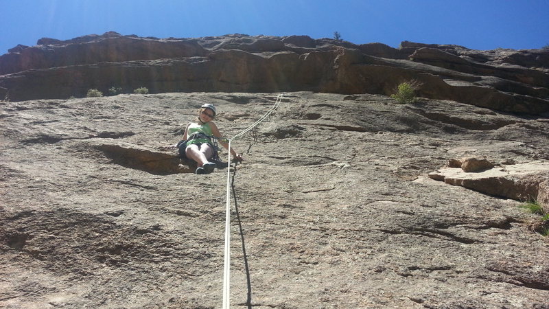 Beverae making her way down by rappel.<br>