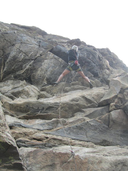 Paul entering the crux roof.