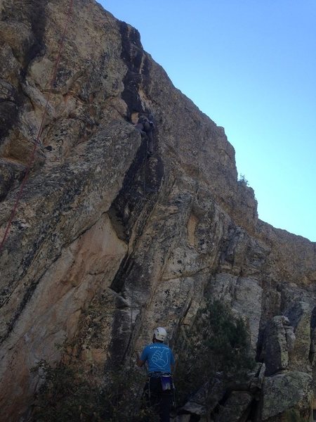 Anna leading Jerk Whisperer. Rope to the left shows approximate route for Fear of Lurking.