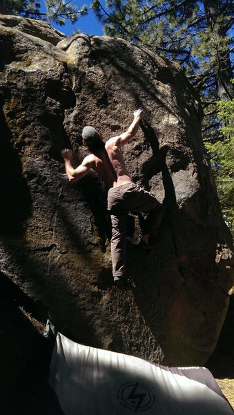 Midway up the face.