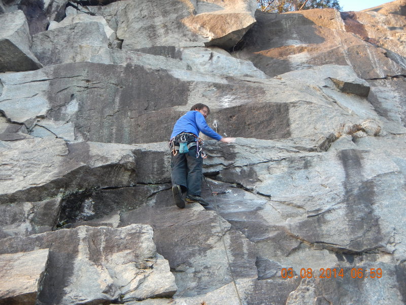 Climbing the route after bolt installation.
